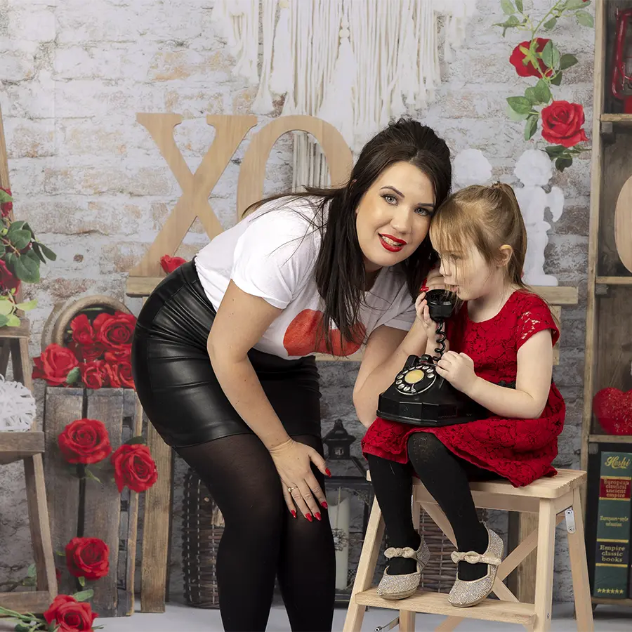 Mother and their little daughter laughing at a Valentine Family Mini Session by Winnipeg Family Photographer Jason Lee