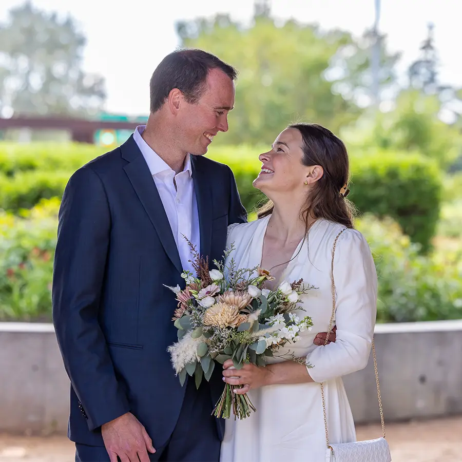 A Métis bride and groom during posing at the Upper Fort Garry, capturing a rich cultural heritage moment during their Winnipeg Wedding.