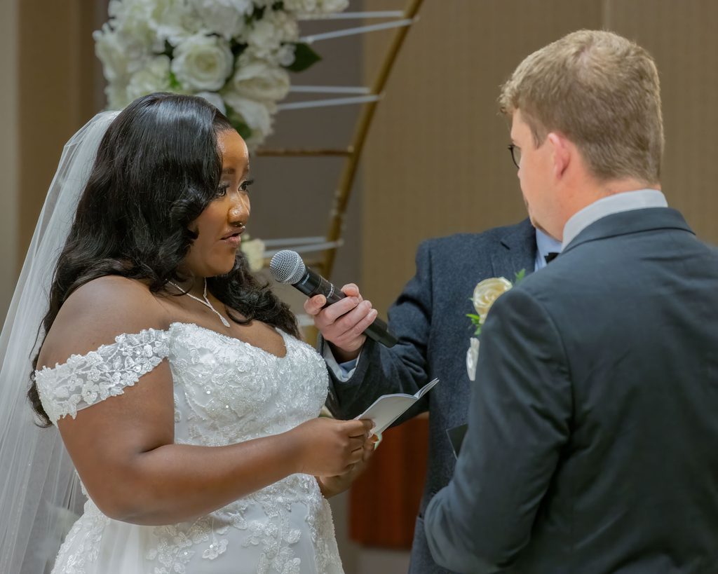 Bride reading her vows during a Viscount Gort Hotel wedding ceremony