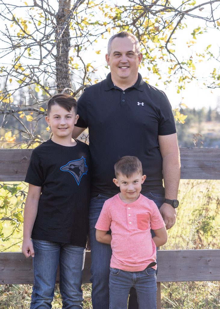 Father with his two sons during a fall family photography session