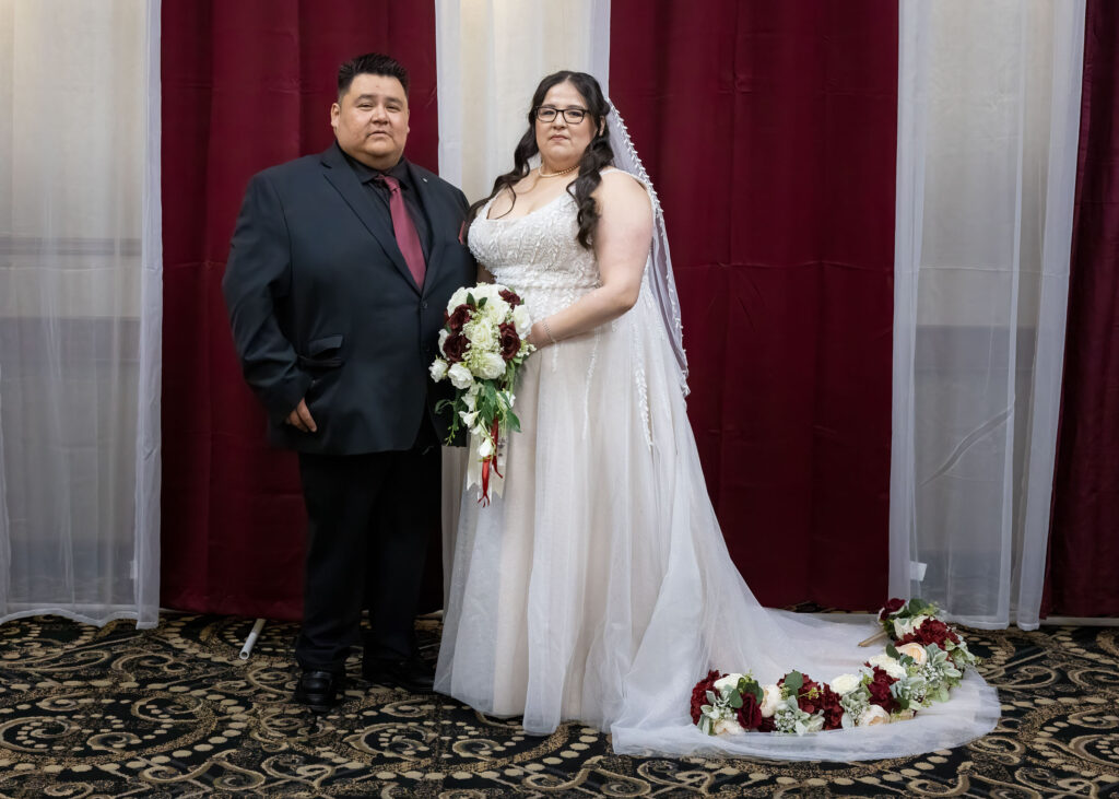 Bride and groom portrait inside the Victoria Inn in Winnipeg
