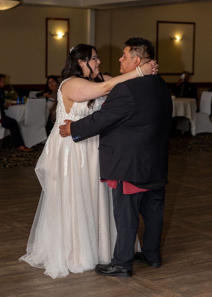 Bride and groom sharing their first dance at the Victoria Inn in Winnipeg