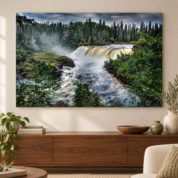 Pisew Falls metal print displayed above a walnut sideboard