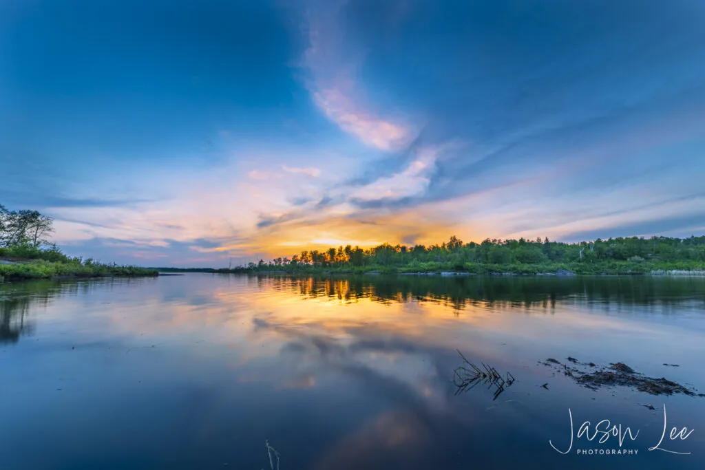 Twilight Tranquility: Reflections of Orange at White Lake